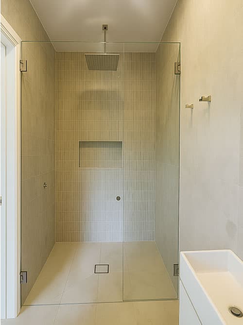 Modern bathroom with frameless shower screen