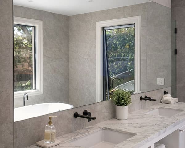 Framed mirror suited to vanity or hallway