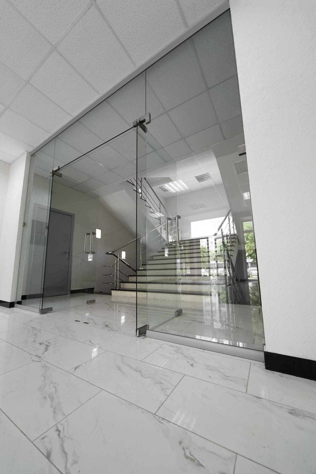 Structural glass floor or walkway with subtle framing